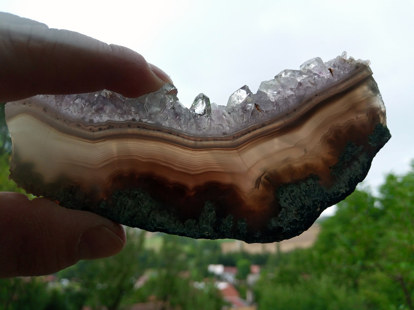 Polished amethyst with moss agate