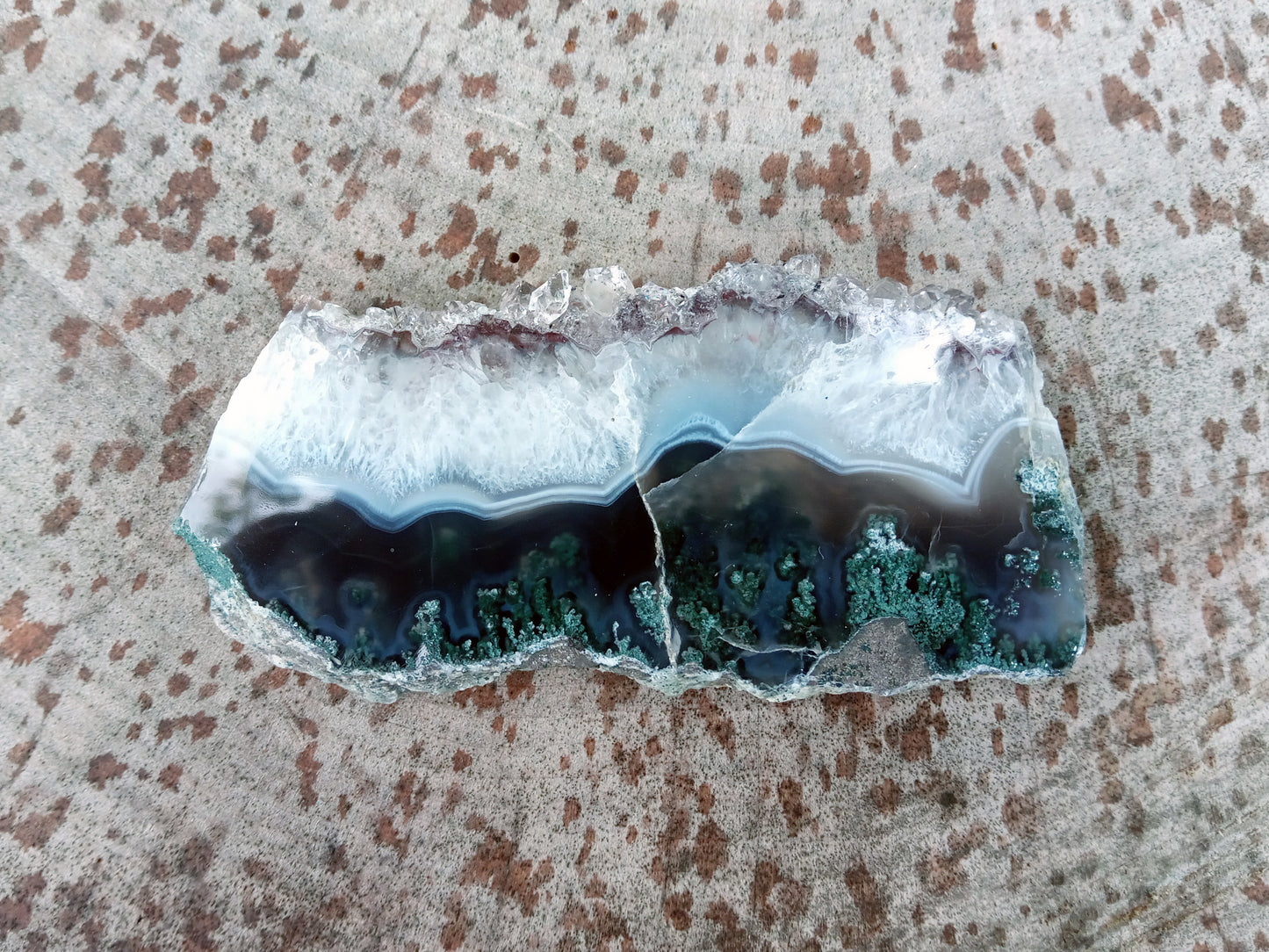 Polished amethyst with moss agate