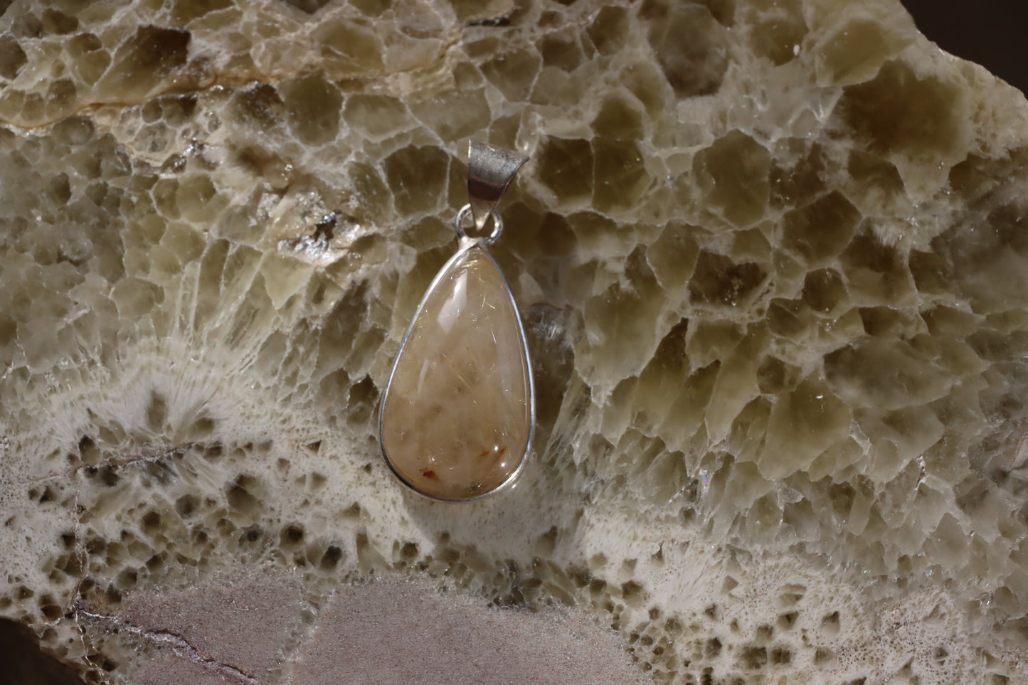 Rutile pendant in crystal