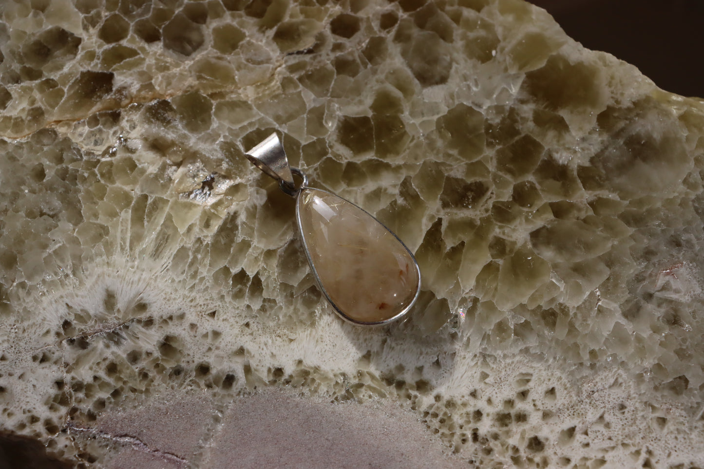 Rutile pendant in crystal