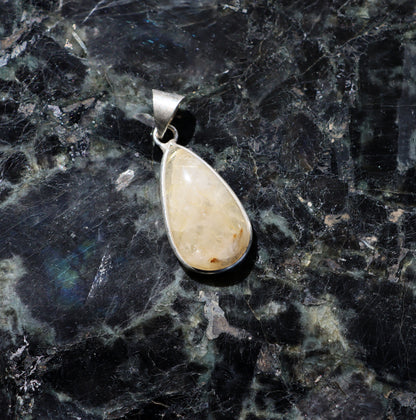 Rutile pendant in crystal