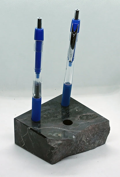 Limestone pencil stand with corals