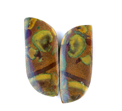 A pair of fruit jasper cabochons