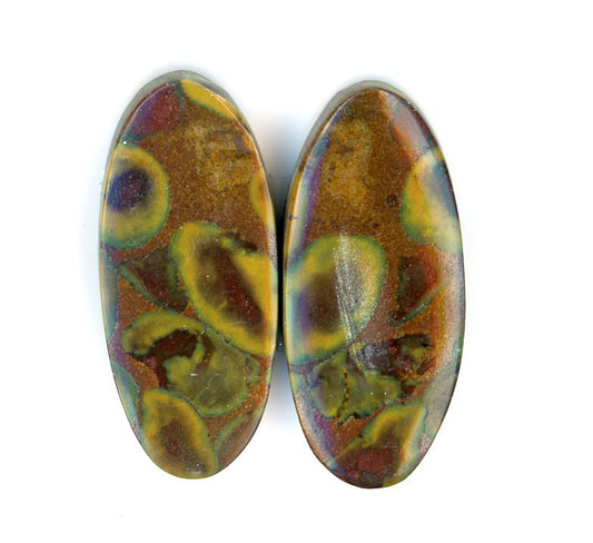 A pair of fruit jasper cabochons