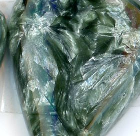 A pair of seraphinite cabochons