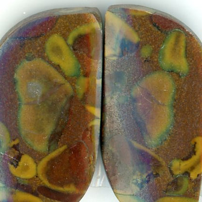 A pair of fruit jasper cabochons