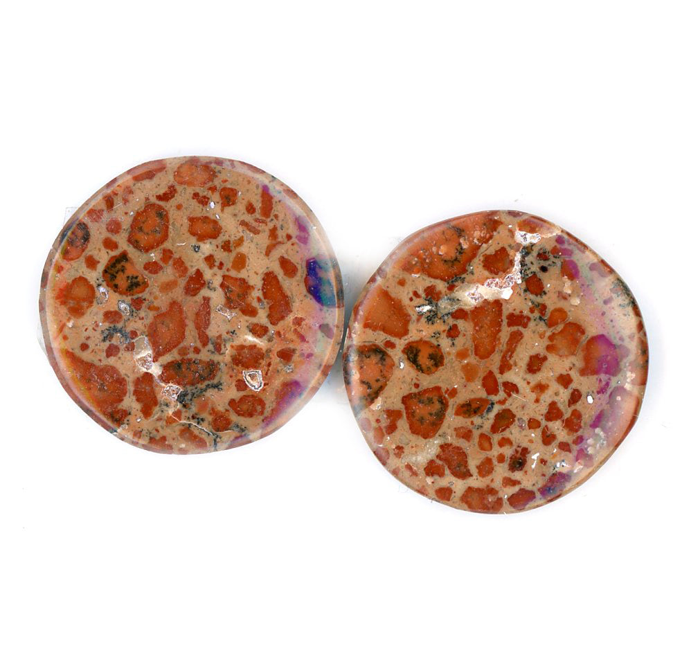 A pair of asteroid jasper cabochons