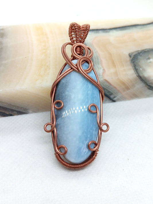 Owyhee blue opal pendant in copper