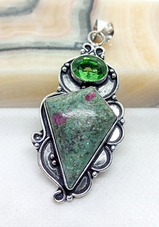 Pendant of rubies in zoisite and olivine